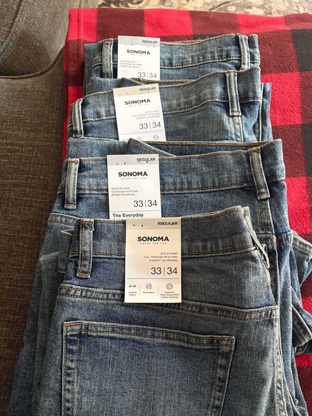 Women shirts men’s jeans men’s adidas pants and sweatshirt